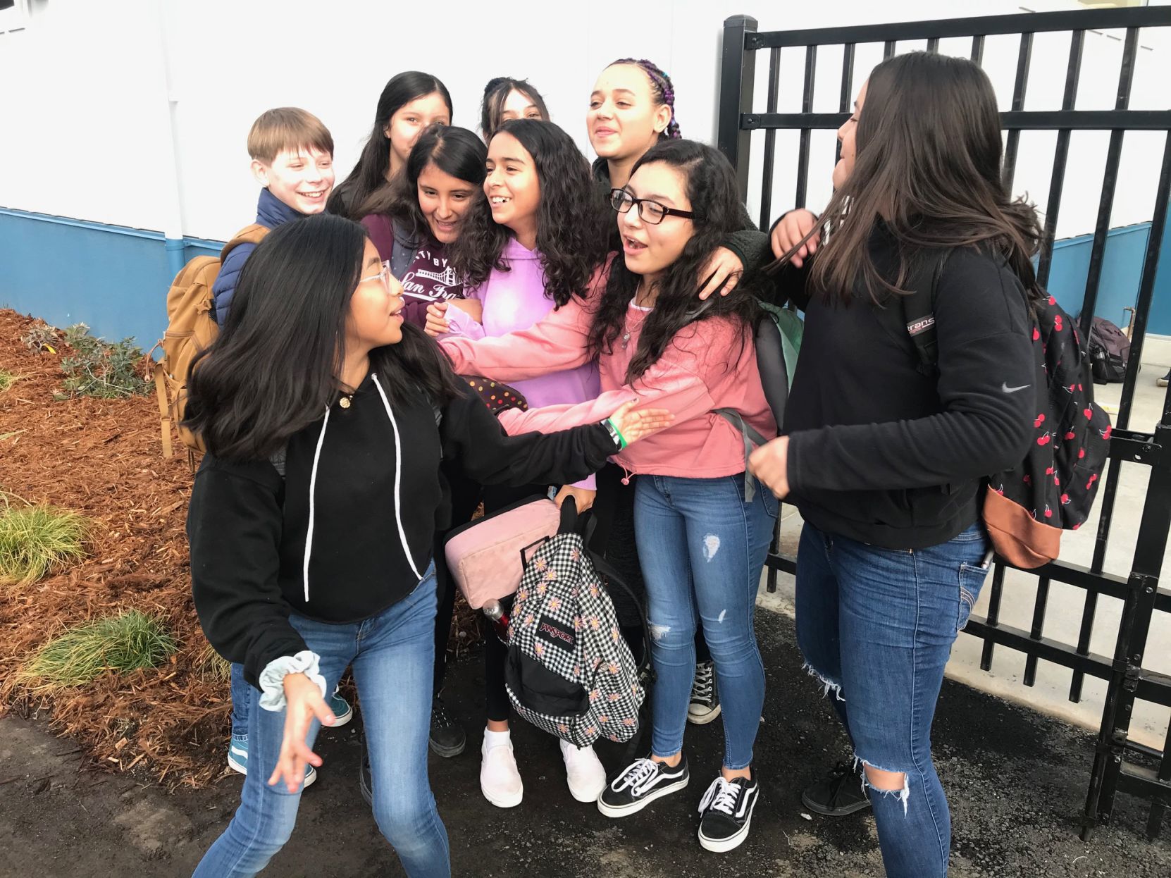 RMS students hang out on the playground at their new campus